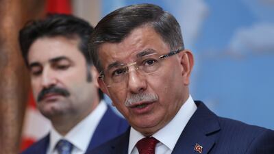 Former Turkish Prime Minister Ahmet Davutoglu holds a press conference at his office in Ankara on September 13, 2019. AFP
