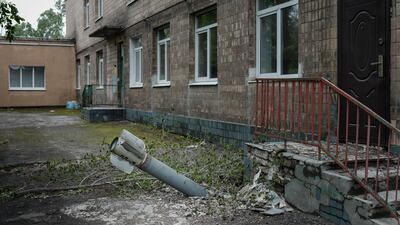 This rocket landed at the backdoor of a kindergarten where seven people have been sheltering in the basement for more than two months, in Lysychansk, eastern Ukraine. AFP