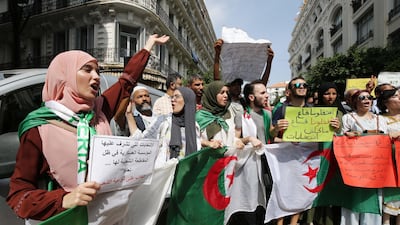 Algerian protesters carrying national flags chant slogans during a students' demonstration against postponing the presidential elections in Algiers, Algeria. According to reports, Algeria will hold elections on 12 December, after the July vote was postponed, amid political vacuum since president Abdelaziz Bouteflika resigned. EPA