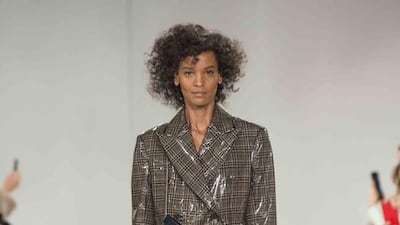 Womenswear plastic coat by Raf Simons for Calvin Klein. Courtesy Calvin Klein