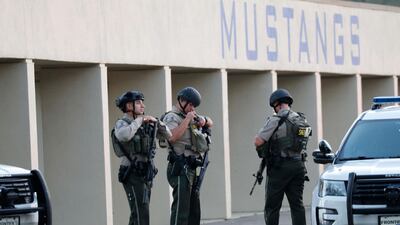 Police officers stand guard. EPA