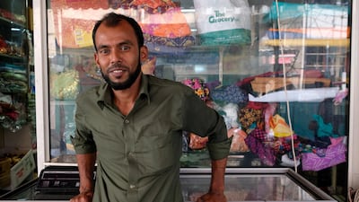Kamal Mia, a father of two from Bangladesh, sells vegetables used in many South Asian kitchens. He has not been able to send any money home this year, but plans to stay and hope for things to change. Jenny Gustafsson
