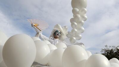 An artist takes part in the opening parade of the 133rd Nice Carnival in southeastern France. Valery Hache / AFP Photo