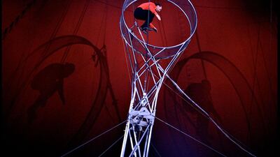Swinging pendulum performers show off their skills while the audience gasp at the group's death-defying acts at the Sarrasani Circus in Khalifa park, Abu Dhabi. Ravindranath K / The National?