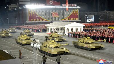 A tank unit parades during a military parade marking the ruling party congress. KCNA / AP