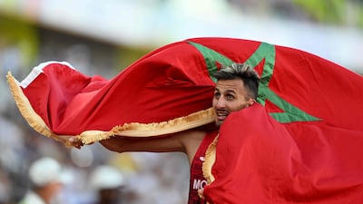 Morocco's Soufiane El Bakkali celebrates winning the men's 3000m steeplechase final during the World Athletics Championships in Eugene, Oregon. AFP