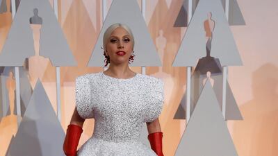 2015: Lady Gaga wears three custom-made pieces by Tunsian designer Azzedine Alaia at the 87th Academy Award. Reuters