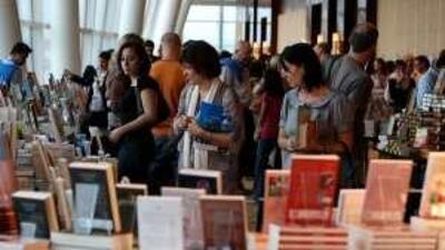 Visitors walk through the Emirates Airlines International Festival of Literature in Dubai Festival City.