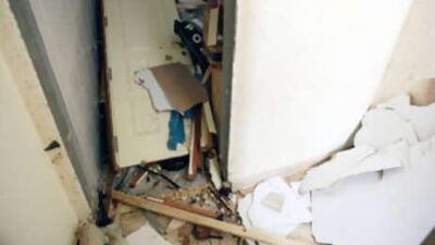 Neighbours said the explosion sounded like a "bomb blast". Below, patio doors were blown into the villa's pool.