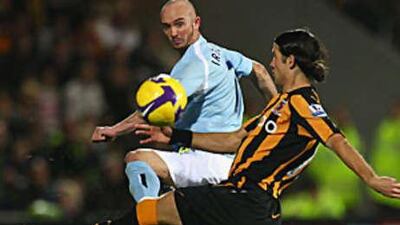 The Manchester City midfielder, Stephen Ireland, in blue, scored two goals in his teams 2-2 draw with Hull City.