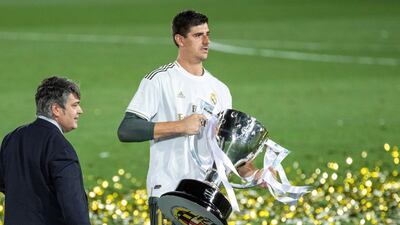 Real Madrid's goalkeeper Courtois with the La Liga trophy. EPA