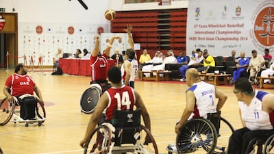 The UAE's men's wheelchair basketball team in action against Jordan at Al Ahli Sports Club in Dubai. Lee Hoagland / The National