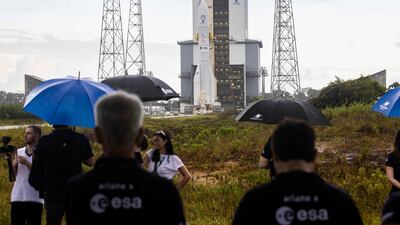 Members of the media gather as Ariane 6 moves to the launch pad in Kourou. AFP