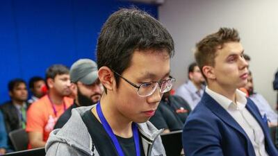 Guya Fan works on his Startup project during the Dubai Startup Weekend at Astrolabs Dubai. Victor Besa for The National