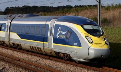 A Eurostar high-speed train heads towards France through Ashford in Kent. PA