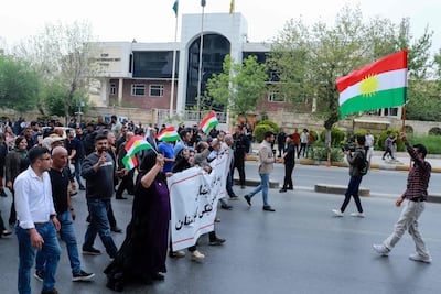The protest drew about 400 people, who waved the flag of Iraqi Kurdistan. AFP