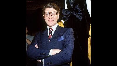French fashion designer Yves Saint Laurent poses in Paris on July 25, 1984. Saint Laurent, one of the 20th century's greatest couturiers, credited for revolutionising women's wardrobes, died on June 1, aged 71 of a brain tumour. AFP PHOTO