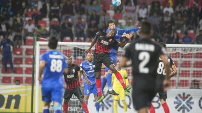 Makhete Diop (No 99) goes for a header against Esteghlal during their Asian Champions League tie on February 20, 2017. Antonie Robertson / The National