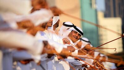 A group of men perform a traditional Emirati dance. Sammy Dallal/The National