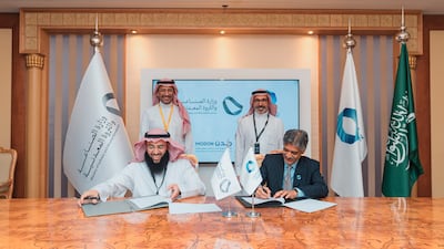 Bandar AlKhorayef, Saudi Arabia's Minister for Industry and Mineral Resources, and Nadhmi Al Nasr, chief executive of Neom, witnessing the signing ceremony. Photo: Oxagon