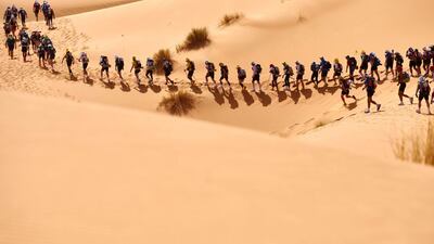 Competitors take part in the 31st edition of the Marathon des Sables in the Sahara desert in southern Moroccan. Jean-Philippe Ksiazek / AFP Photo