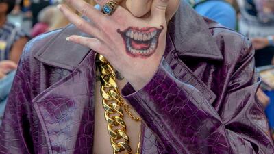 Matthew Morningstar from Tucson, Arizona, is dressed as the Joker. AP Photo