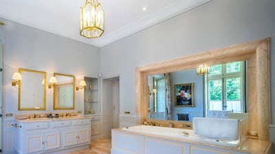 A spacious bathroom, complete with a whirlpool bath. Courtesy Chateau De Tourreau