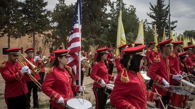Members of the Syrian Democratic Forces band play the American anthem during a SDF victory ceremony announcing the defeat of ISIS in Baghouz held at Omer Oil Field on March 23, 2019 in Deir Al Zor, Syria. Getty Images