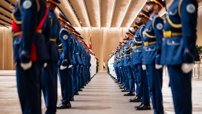 The honour guard in place as part of the welcoming ceremony for the French President, who arrived from Kuwait. UAE Presidential Court