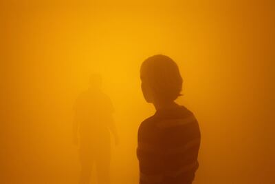A woman stands in Eliasson's fog-filled installation, where the visibility is only 1.5 meters. Titled Din blinde passager (Your blind passenger), 2010. Photo: Supplied