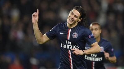 Paris Saint-Germain's Edinson Cavani celebrates after scoring a goal in PSG's Champions League win over Apoel Nicosia on Wednesday in Paris. Martin Bureau / AFP / November 5, 2014