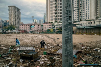 A football pitch covered with mud. AFP