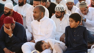 Worshippers attend Eid Al Fitr prayers at Al Barsha Eid Musalla in Dubai on Sunday. Challenges across the region mean that the empathy and consideration that characterises the festival will be needed long after it has passed. EPA