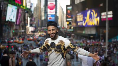 Adam Saleh poses for a portrait in Manhattan's Times Square. Dave Sanders for The National