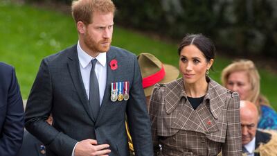Meghan, Duchess of Sussex wears a Karen Walker coat and Asos dress at the Tomb of the Unknown Warrior at Pukeahu National War Memorial Park in Wellington, New Zealand, on October 28, 2018. AP