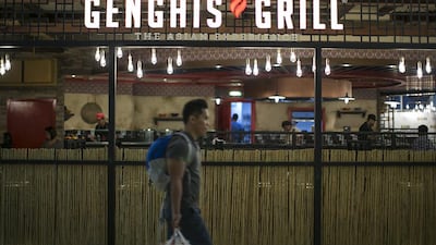 Above, Genghis Grill restaurant at the Wahda Mall extension in Abu Dhabi. Mona Al Marzooqi / The National