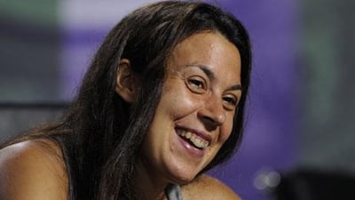 Marion Bartoli concedes she is not blonde but says she never dreamed to have a model contract anyway.