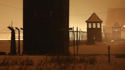 Guard towers and barbed wire fences stand at the former Auschwitz-Birkenau concentration camp in Oswiecim, Poland. Getty Images