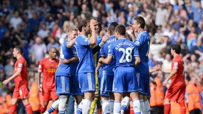Chelsea players celebrate winning 2-0 at the end of the English Premier League football match between Liverpool and Chelsea at Anfield Stadium in Liverpool, northwest England, on April 27, 2014. AFP PHOTO / ANDREW YATES