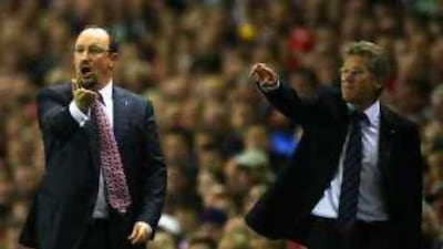 Laszlo Boloni, right, with the Liverpool manager Rafael Benintez, admits it will be tough to keep his best players at Standard Liege in the face of interest from other clubs.