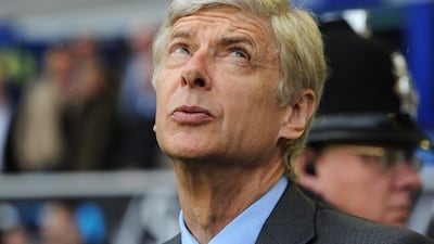 Arsenal manager Arsene Wenger reacts during his side's loss to Everton on Sunday. Peter Powell / EPA / April 6, 2014