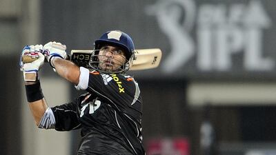 Yuvraj Singh, seen here playing for the Pune Warriors in the 2011 edition of the Indian Premier League, fetched US$2.3 million at the 2014 auction. But with his marketing potential, his new franchise, the Royal Challengers Bangalore, must have been happy to make him the most expensive player this year. Punit Paranjpe / AFP