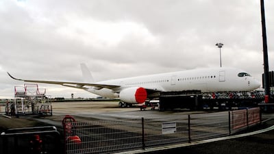 A white-painted A350 being prepared for delivery without an airline livery on the tarmac in Colomiers, France. REUTERS/Tim Hepher
