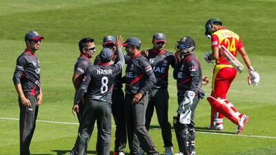 The UAE, pictured celebrating the wicket of Sikandar Raza, were only narrowly beaten by a vastly more experienced Zimbabwe side. Hagen Hopkins / Getty