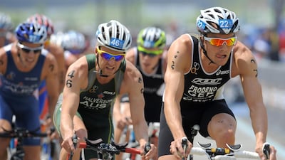 Germany's Jan Frodeno, right, completed an Ironman challenge from his home in Girona, Spain. AFP