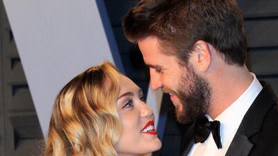 The happy couple: newly-weds Miley Cyrus and Liam Hemsworth pose at the 2018 Vanity Fair Oscar Party following the 90th Academy Awards ceremony. EPA