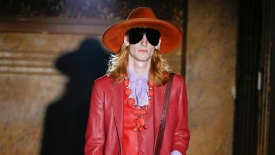 Retro menswear appeared during the women's fashion show at Gucci, with this mismatched leather suit. 