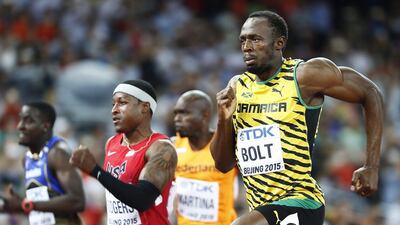 Usain Bolt of Jamaica paces Mike Rogers of the US in Saturday's 100m heats at the Athletics World Championships in Beijing. Diego Azubel / EPA / August 22, 2015