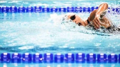 Canada's Olivia Anderson cuts through the water in the 800-metre freestyle event in Dubai. She finished in 13th place. Lee Hoagland / The National