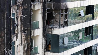 Residents of Tamweel tower in Jumeirah Lake Towers will spend the third anniversary of the fire still unable to return to their homes. Pawan Singh / The National